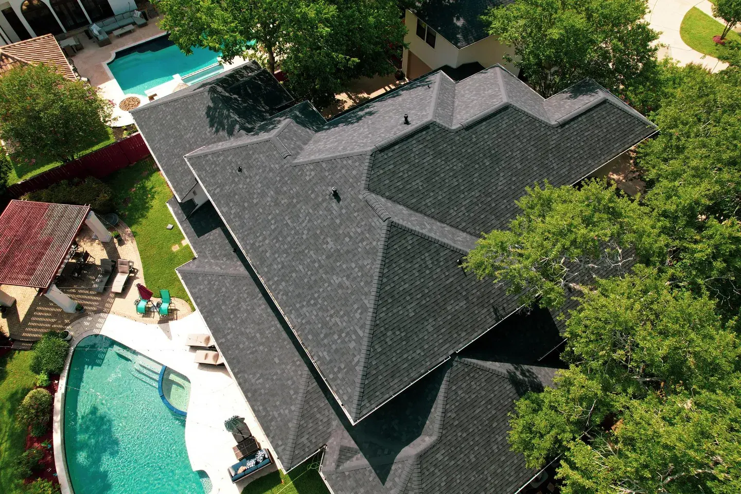Recent San Antonio roofing project: aerial view of a finished shingle roof