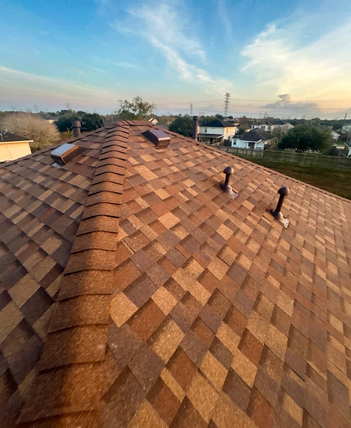 Designer shingle roof detail at sunset
